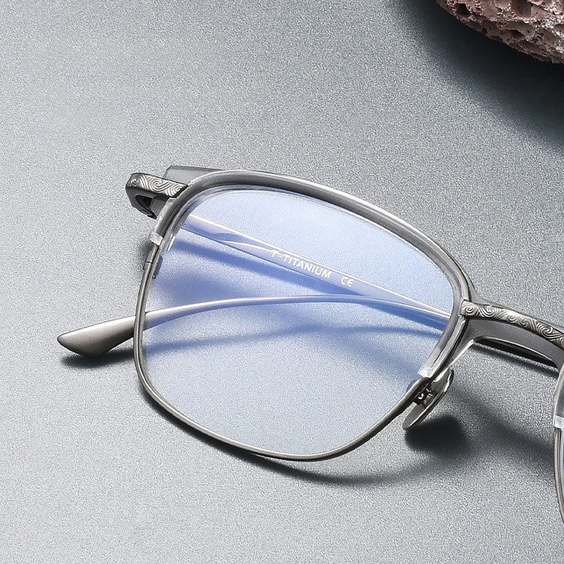 Unisex full-frame Browline glasses made of Titanium. 99LYNX